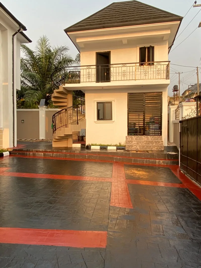 Adjoining building and curved exterior staircase