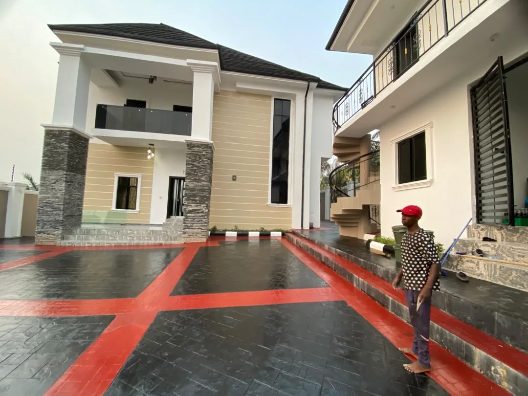 Wide view of completed residence and courtyard