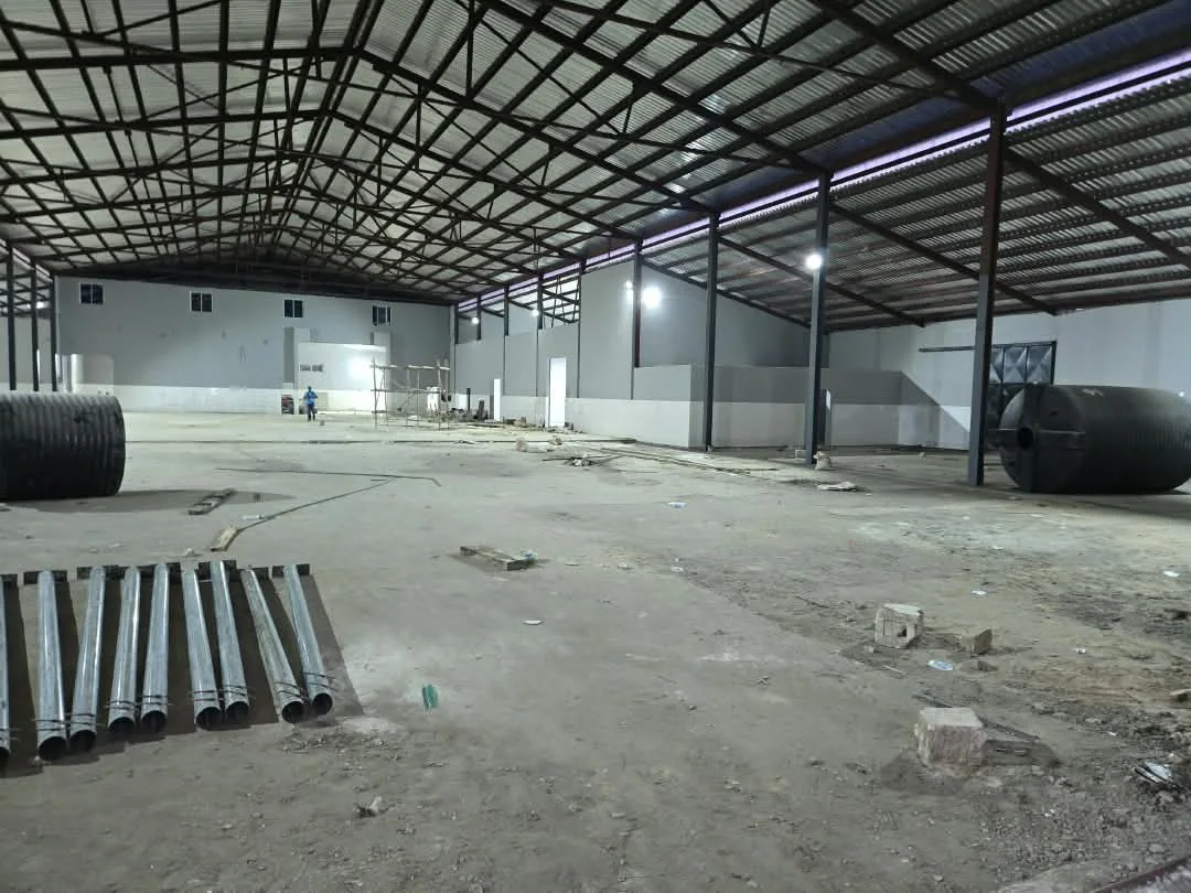 Wide view of factory interior during renovation