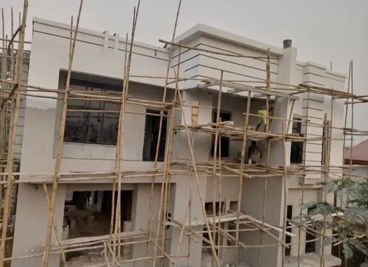 Residence facade while finishing work was under way
